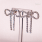Silver Diamanté Wide Bow Earrings