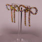 Iridescent Gold Diamanté Wide Bow Earrings