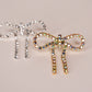 Iridescent Gold Diamanté Wide Bow Earrings