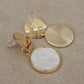 Oyster Glow Gold Statement Earrings