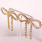 Iridescent Gold Diamanté Wide Bow Earrings