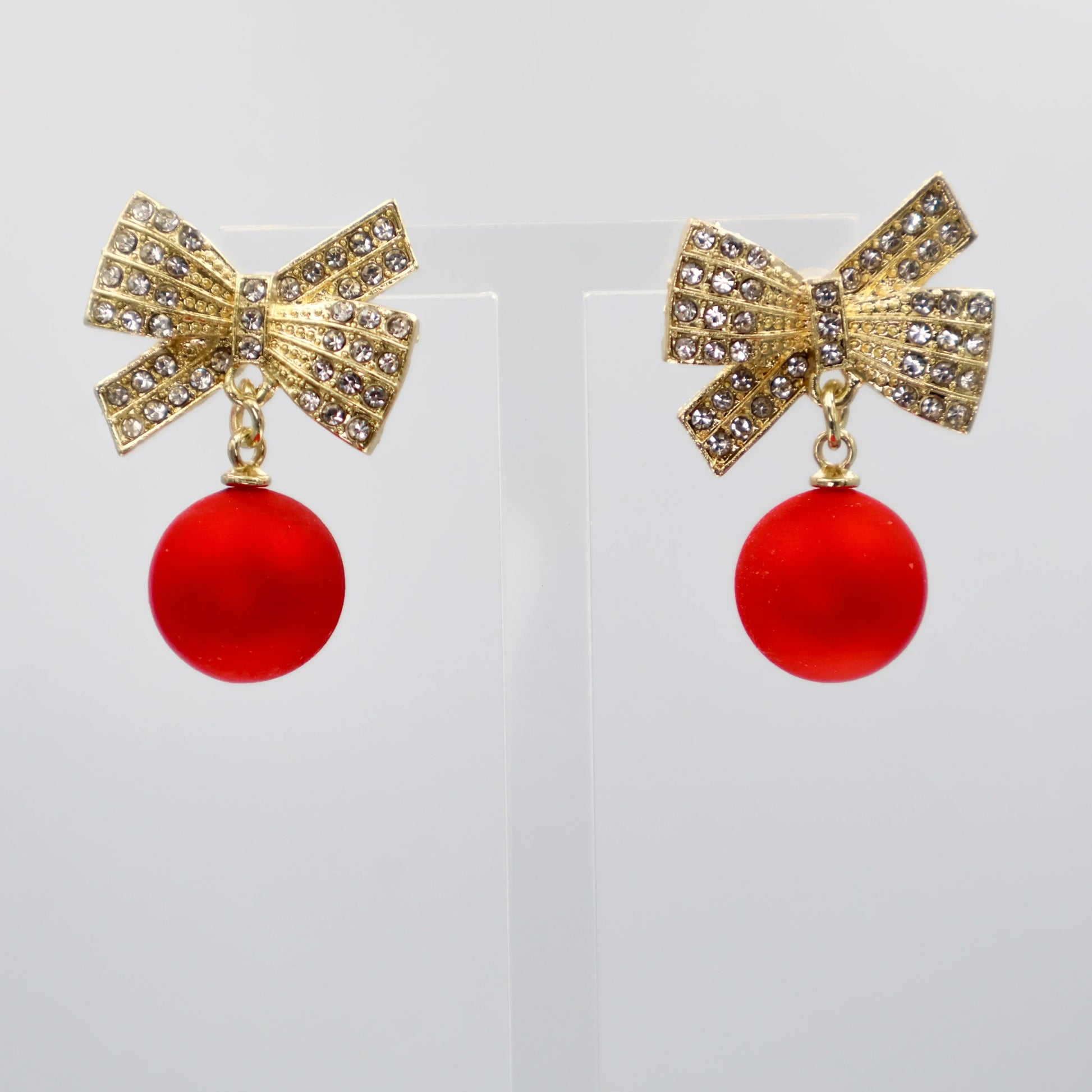 Gold diamanté bow earrings with red ball drop – festive Christmas jewellery