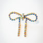 Iridescent Gold Diamanté Wide Bow Earrings