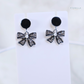 Black & Silver Enamel Bow Earrings – Crystal & Pearl Statement Studs