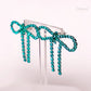 Teal Diamanté Wide Bow Earrings