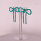 Teal Diamanté Wide Bow Earrings