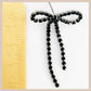 Diamante Bow Earrings - Red & Gold
